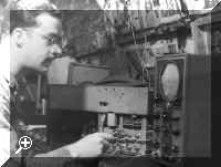 Mike working on TV at his bench within the Signal's Section > Simply click to enlarge... then use the [Back] button to return